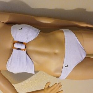 White 2 pc swimwear. Size L, New without tag.